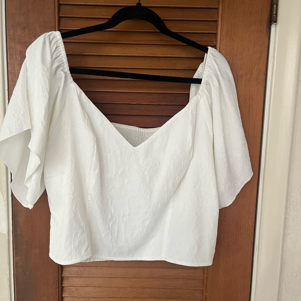 White blouse with floral pattern